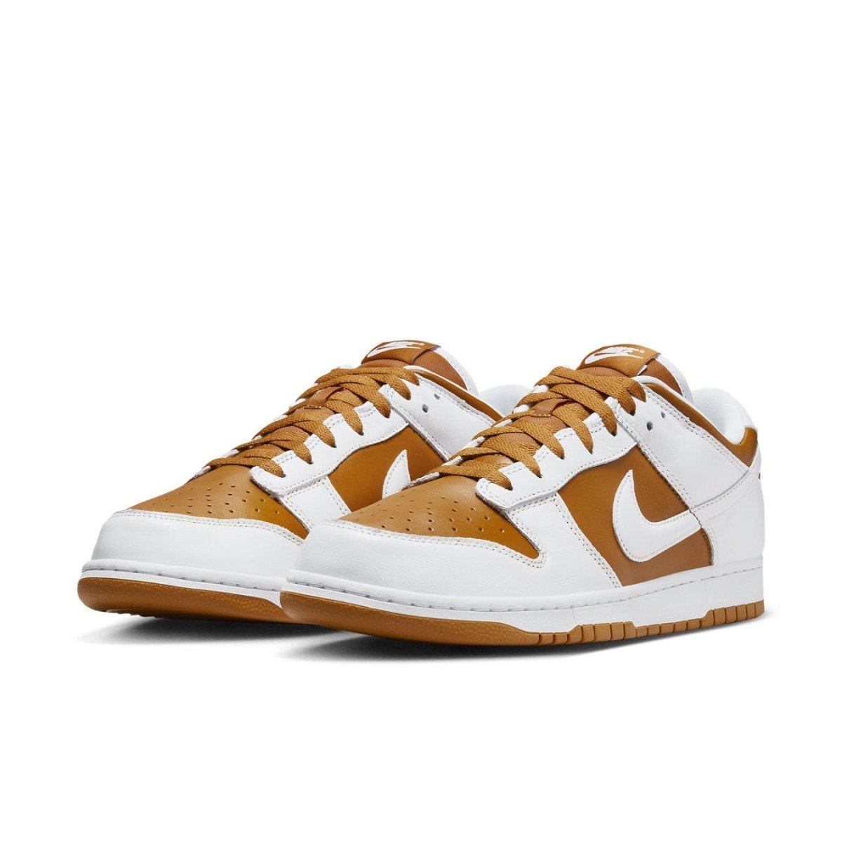 Nike Dunk Low QS CO.JP Reverse Curry 2024, brown and white sneaker with classic design elements.