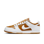 Nike Dunk Low QS CO.JP Reverse Curry 2024 sneaker in brown and white leather with classic design features.