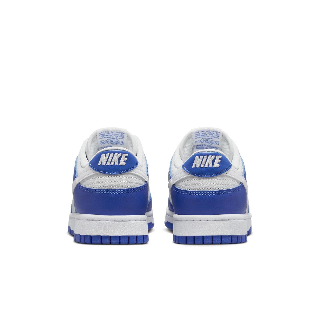 Nike Dunk Low Racer Blue Photon Dust sneakers viewed from the back, featuring a blue and white colorway with iconic Nike branding.