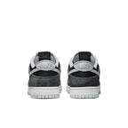 Back view of Nike Dunk Low Retro Animal Pack Zebra sneakers in black and gray with classic Swoosh design.