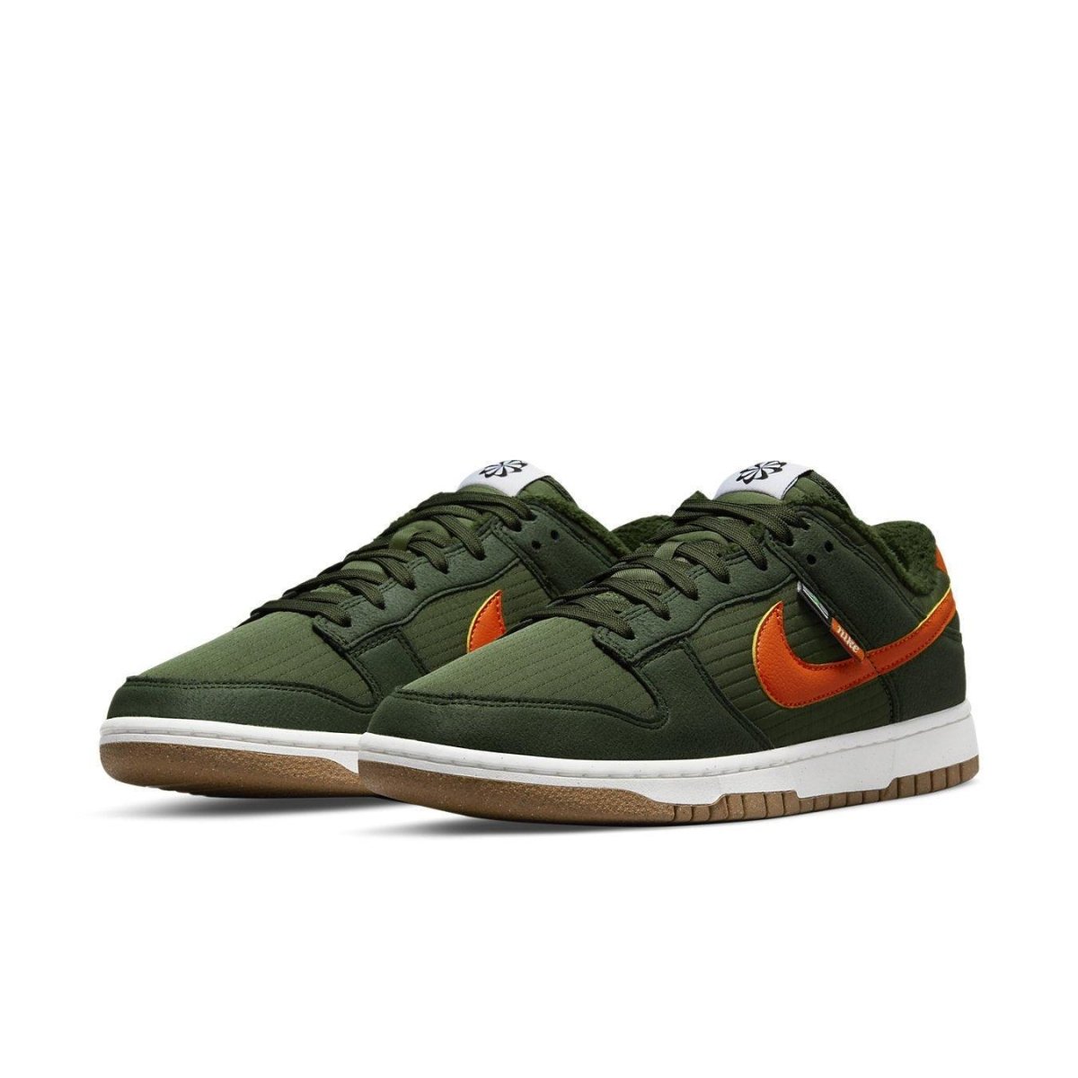 Nike Dunk Low Retro NN Toasty Sequoia in green with orange Swoosh, designed for winter wear with recycled materials.