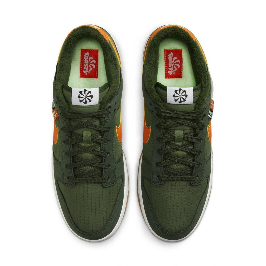 Nike Dunk Low Retro NN Toasty Sequoia top view, featuring green upper, orange swoosh, and fleece lining.