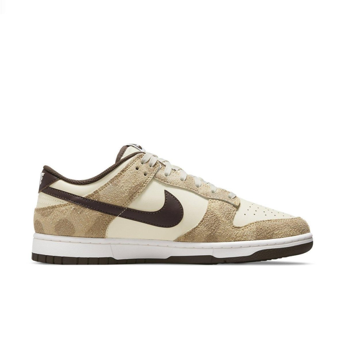 Nike Dunk Low Retro PRM Animal Pack in Giraffe/Cheetah colorway featuring premium materials and animal print design.