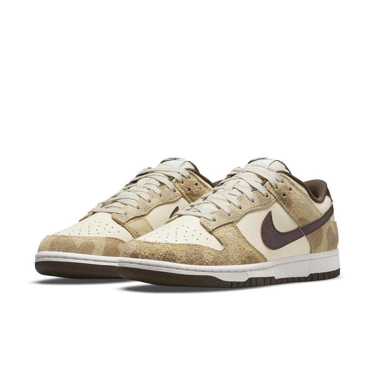 Nike Dunk Low Retro PRM Animal Pack in beige and brown, featuring animal print and premium materials.