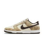 Nike Dunk Low Retro PRM Animal Pack in beige and brown, featuring animal print accents and premium materials.