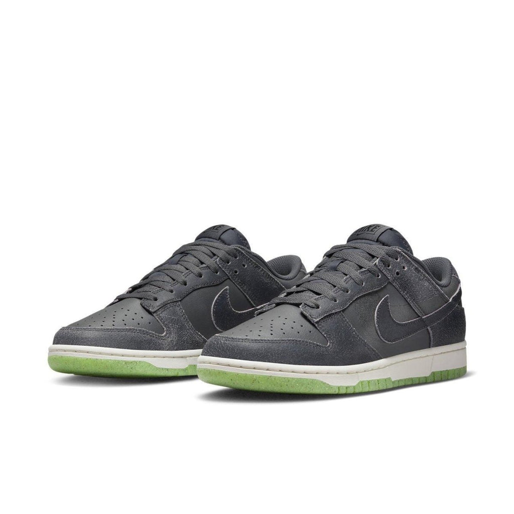Nike Dunk Low Retro PRM Halloween 2022 sneakers featuring double swoosh and spooky design elements.