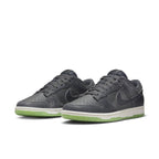Nike Dunk Low Retro PRM Halloween 2022 sneakers featuring double swoosh and spooky design elements.