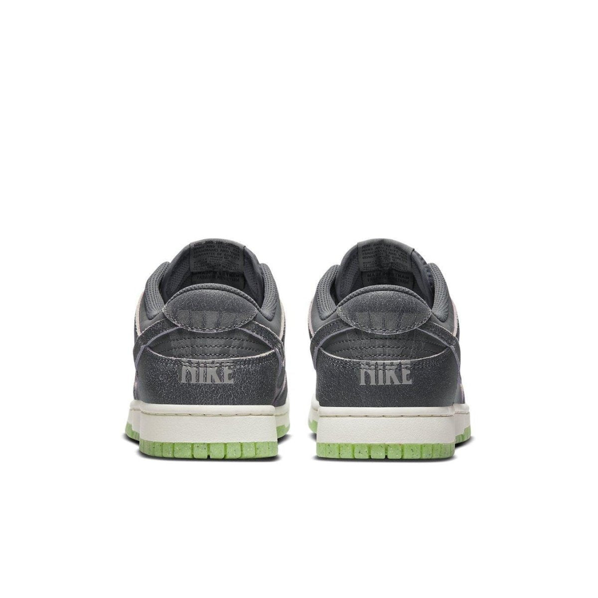 Nike Dunk Low Retro PRM Halloween 2022 sneaker rear view, featuring double Swoosh and eerie branding.