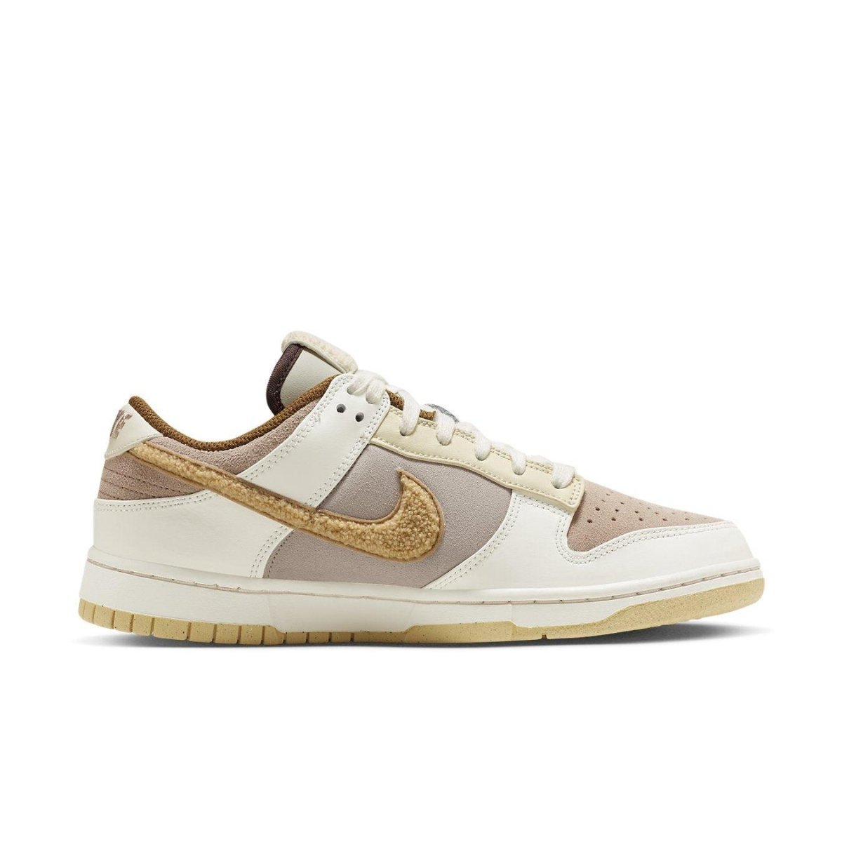 Nike Dunk Low Retro PRM Year of the Rabbit in Fossil Stone colorway, featuring unique textures and Chinese rabbit symbols.