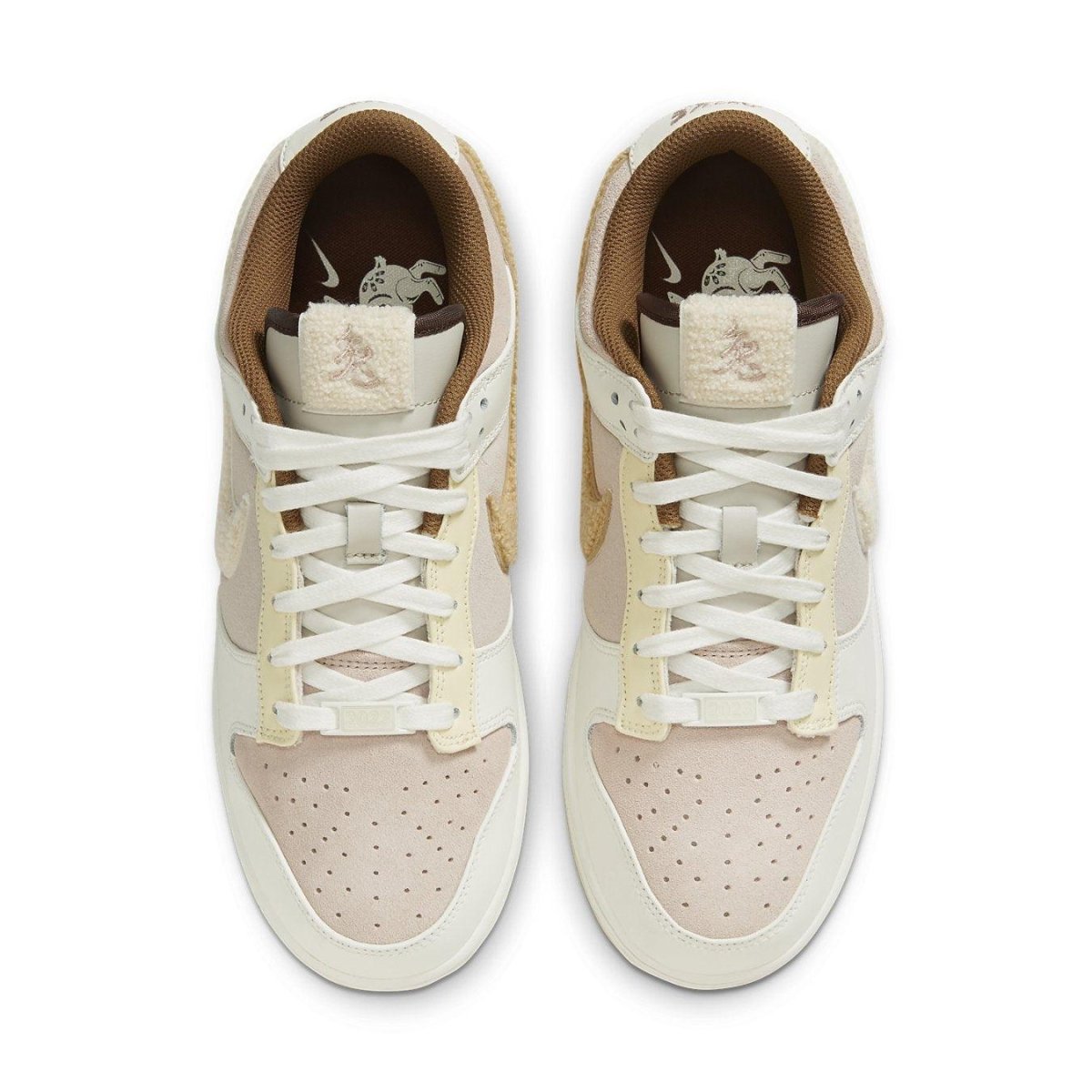 Top view of Nike Dunk Low Retro PRM Year of the Rabbit Fossil Stone featuring beige and cream colorway.