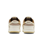 Nike Dunk Low Retro PRM Year of the Rabbit Fossil Stone sneakers, featuring unique back design and Swoosh branding.
