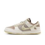Nike Dunk Low Retro PRM Year of the Rabbit in fossil stone with rabbit motifs and suede details.