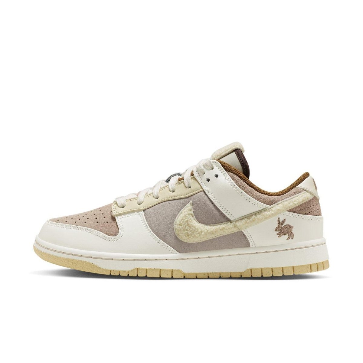 Nike Dunk Low Retro PRM Year of the Rabbit in fossil stone with rabbit motifs and suede details.