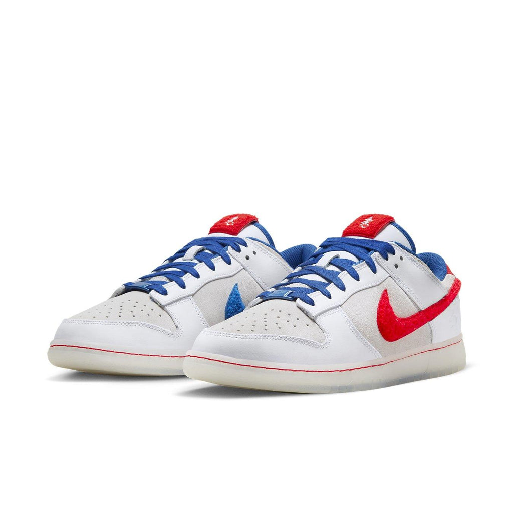 Nike Dunk Low Retro PRM Year of the Rabbit White Rabbit (2023) with blue and red accents and suede details.