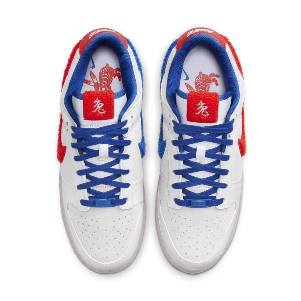 Nike Dunk Low Retro PRM Year of the Rabbit White Rabbit 2023, featuring red and blue accents and rabbit-inspired detailing.