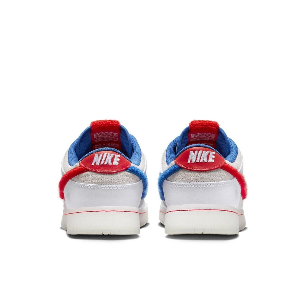 Nike Dunk Low Retro PRM Year of the Rabbit sneaker's rear view, featuring blue and red accents.