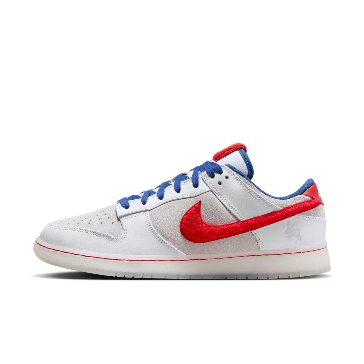 Nike Dunk Low Retro PRM Year of the Rabbit White Rabbit sneaker side view with red Swoosh and blue accents.