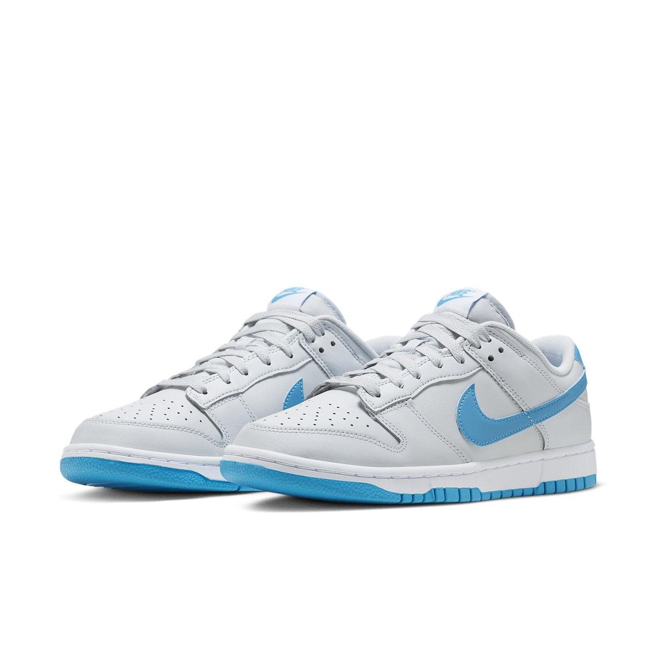 Nike Dunk Low Retro Pure Platinum Blue Lightning sneakers featuring a grey leather upper with blue accents.