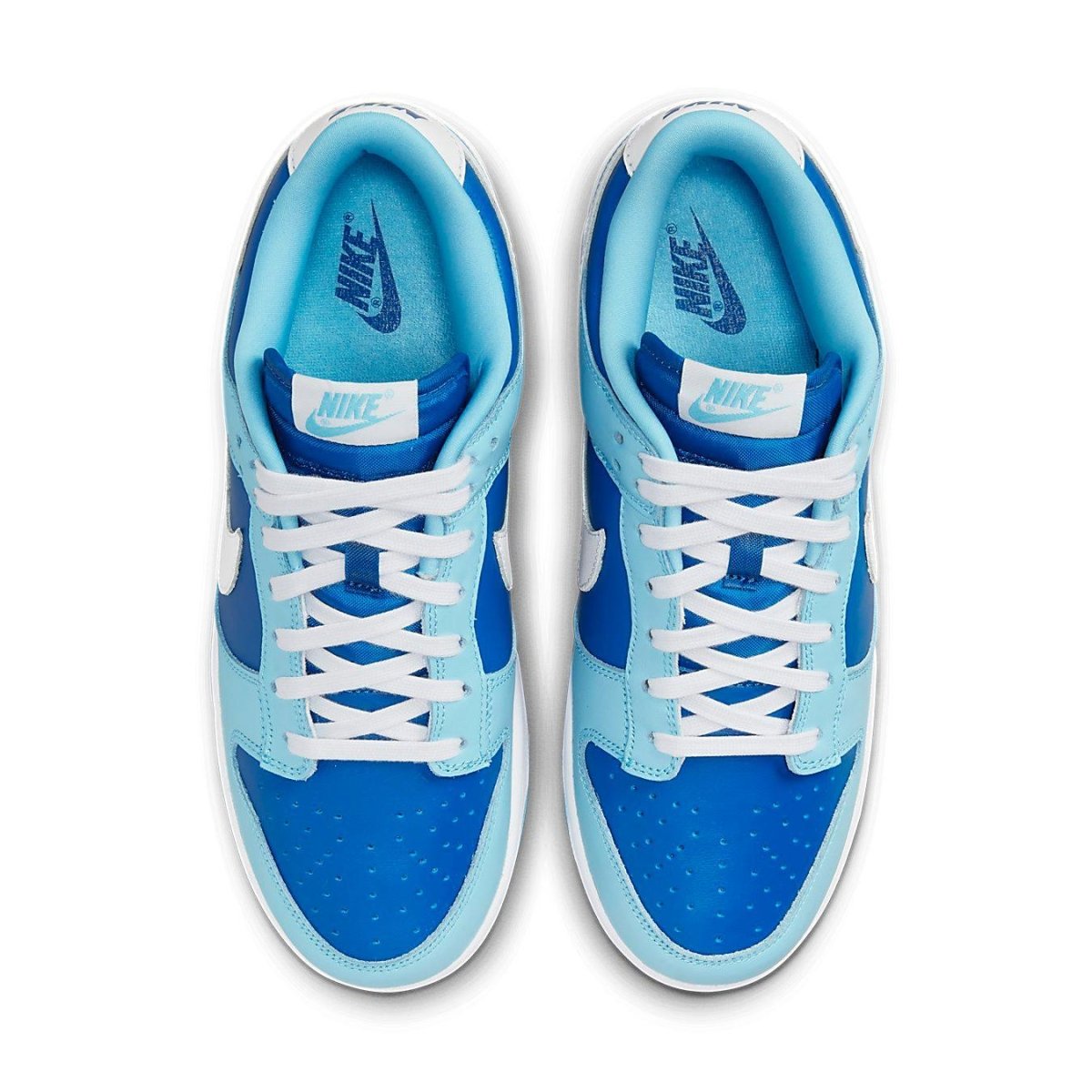 Top view of Nike Dunk Low Retro QS Argon 2022 sneakers in blue tones with white Swoosh and laces.