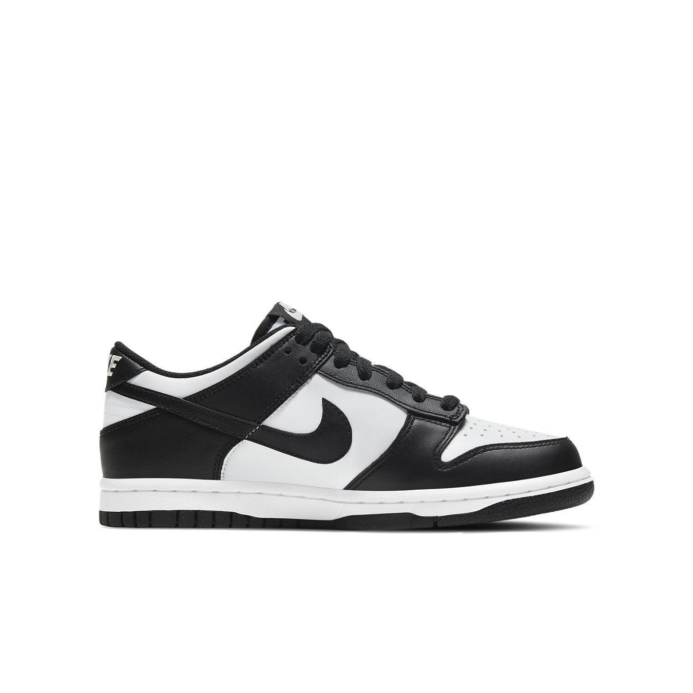 Nike Dunk Low Retro White Black sneaker featuring a clean two-tone design for kids.