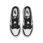 Nike Dunk Low Retro White Black GS sneakers with black and white leather upper, designed for kids.