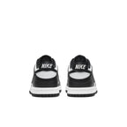 Nike Dunk Low Retro White Black GS sneaker rear view, featuring black and white leather design.