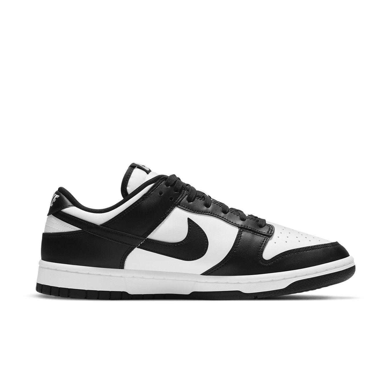 Nike Dunk Low Retro White Black Panda sneaker side view with classic black and white design.