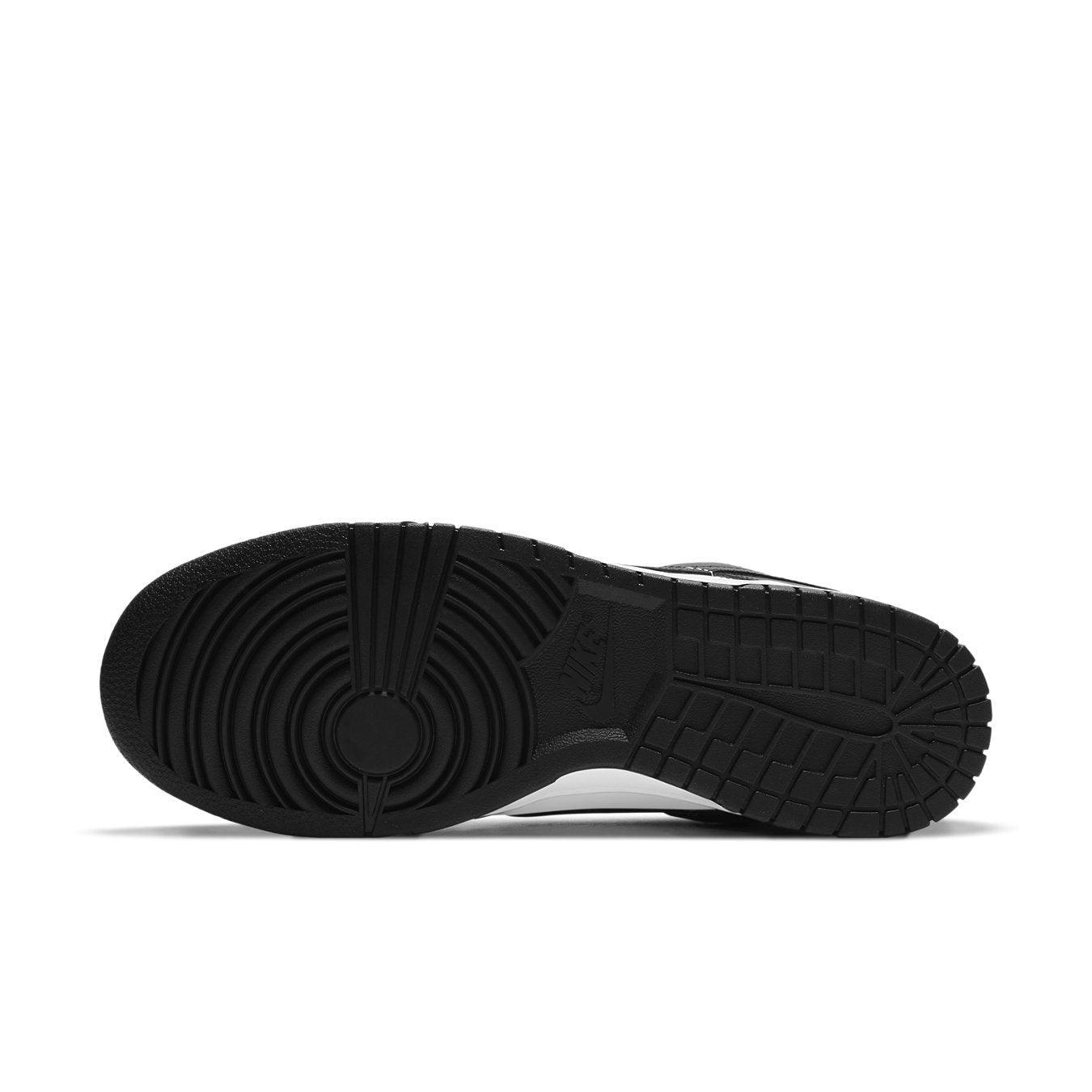 Nike Dunk Low Retro White Black Panda 2021 sneaker sole view with detailed tread design.