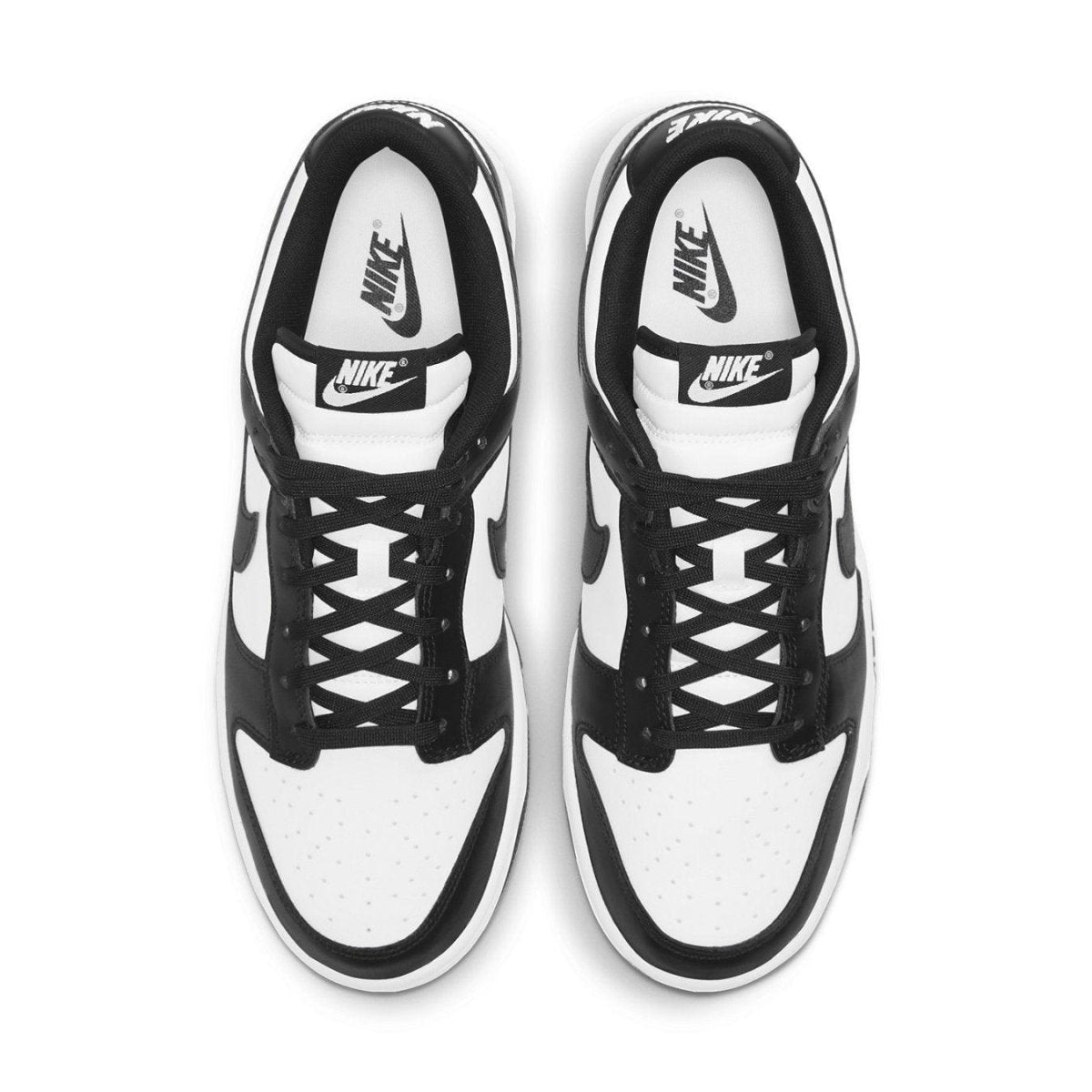 Nike Dunk Low Retro White Black Panda 2021 sneakers showcasing a luxurious leather upper and iconic black swoosh.