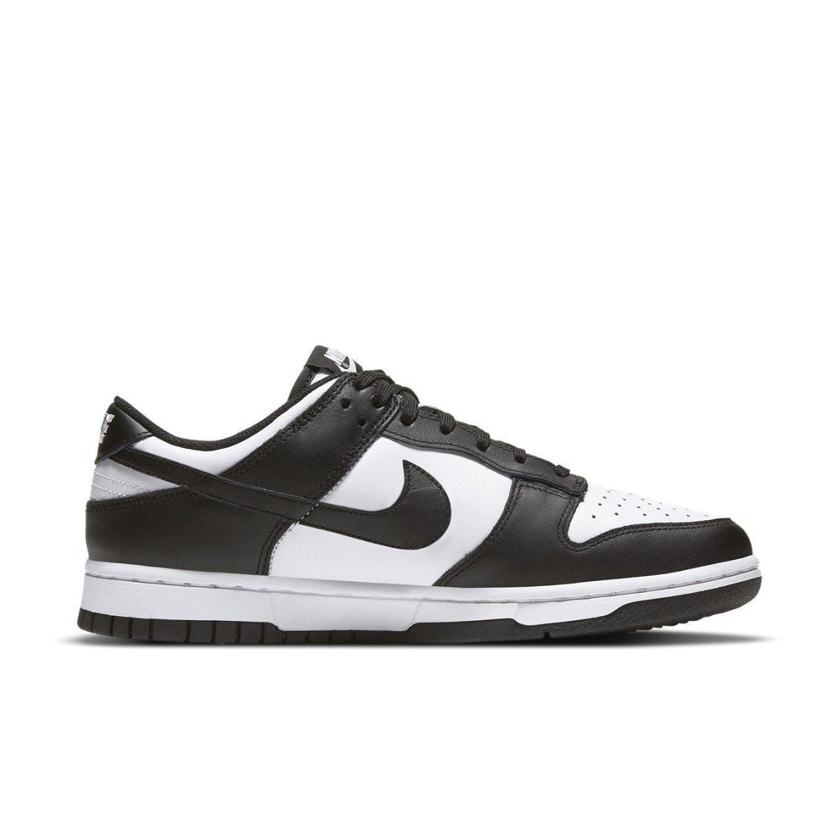 Nike Dunk Low Retro White Black Panda 2021 Women's sneaker in black and white leather side view.