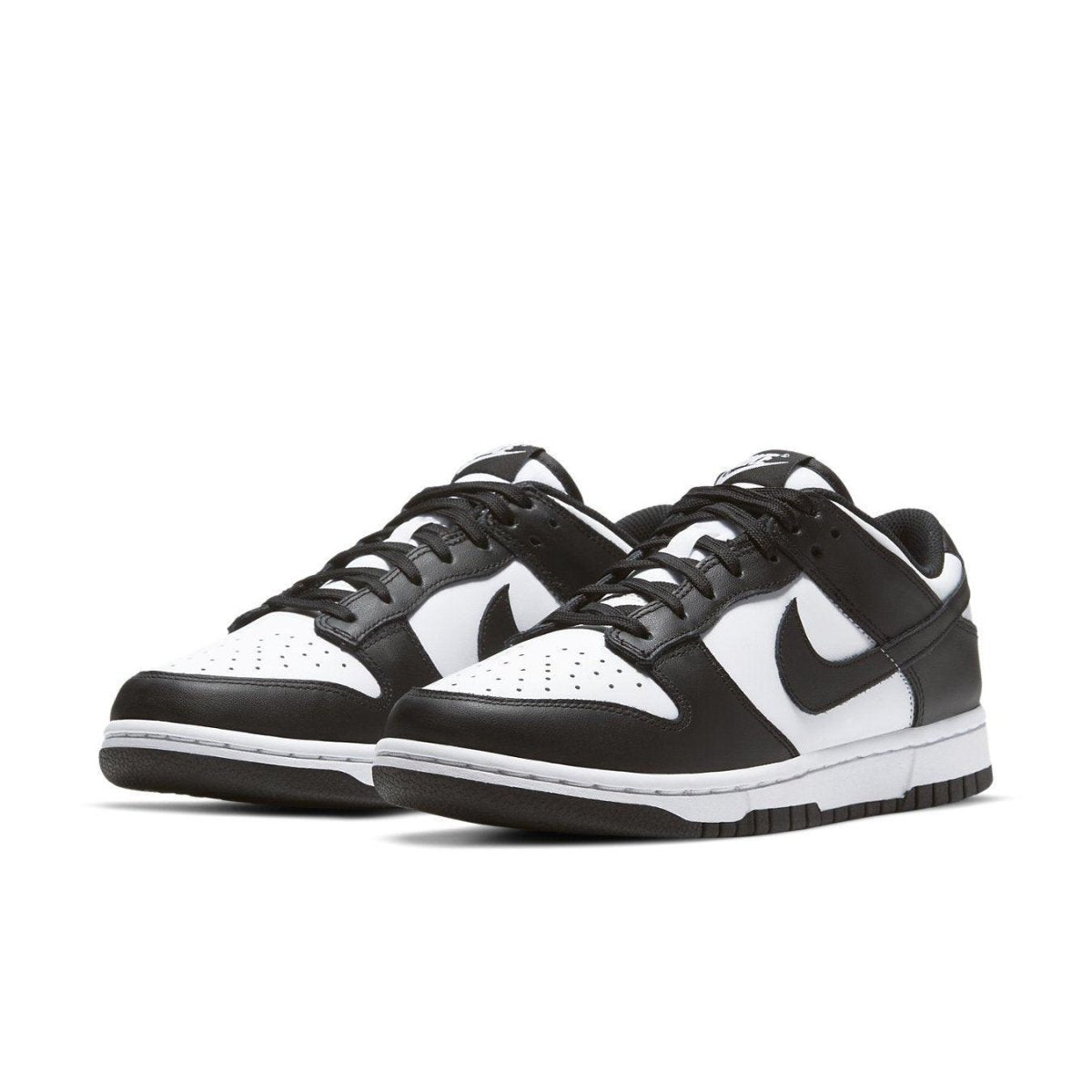 Nike Dunk Low Retro White Black Panda (2021) women's sneakers in black and white, showcasing stylish leather design.