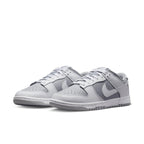 Nike Dunk Low Retro White Grey sneaker featuring a gray and white design with classic low-top silhouette.