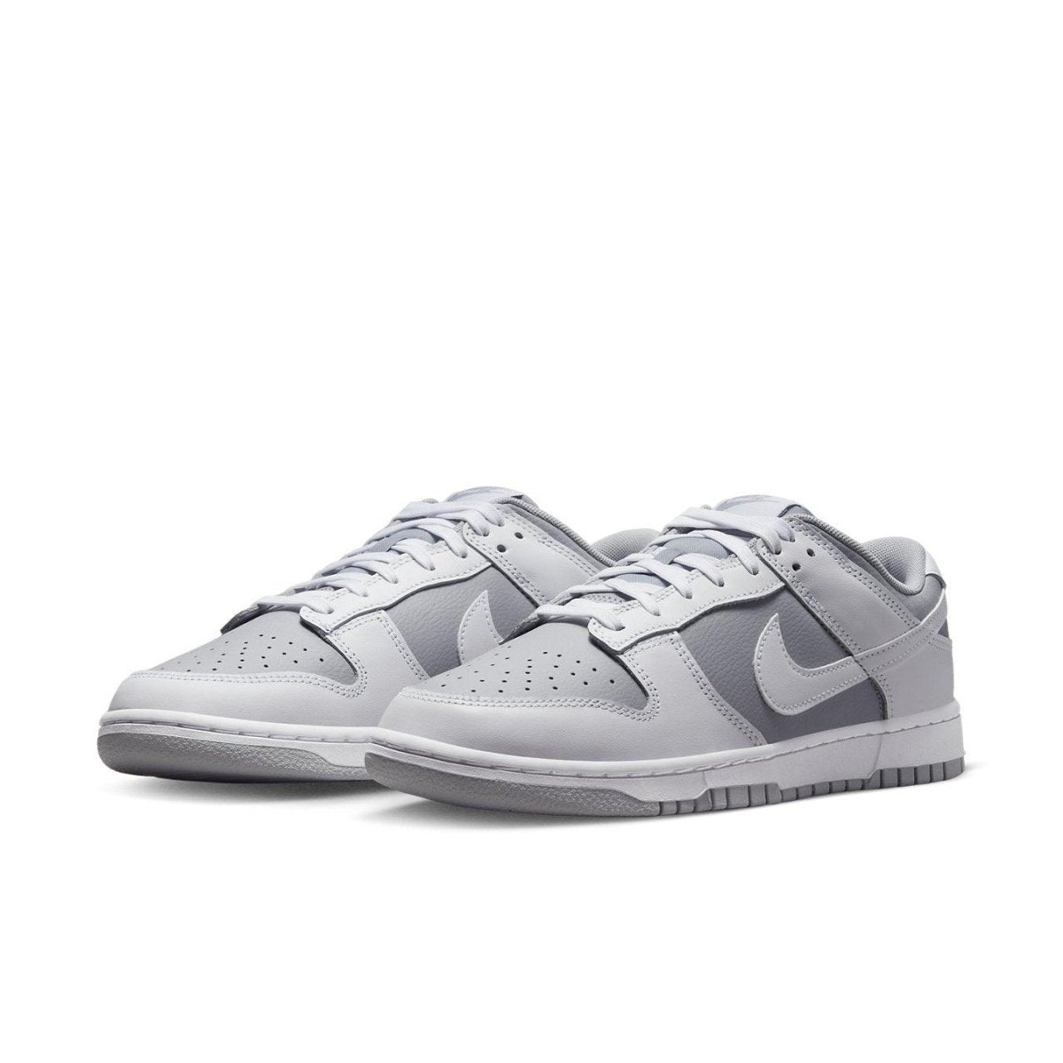 Nike Dunk Low Retro White Grey sneaker featuring a gray and white design with classic low-top silhouette.