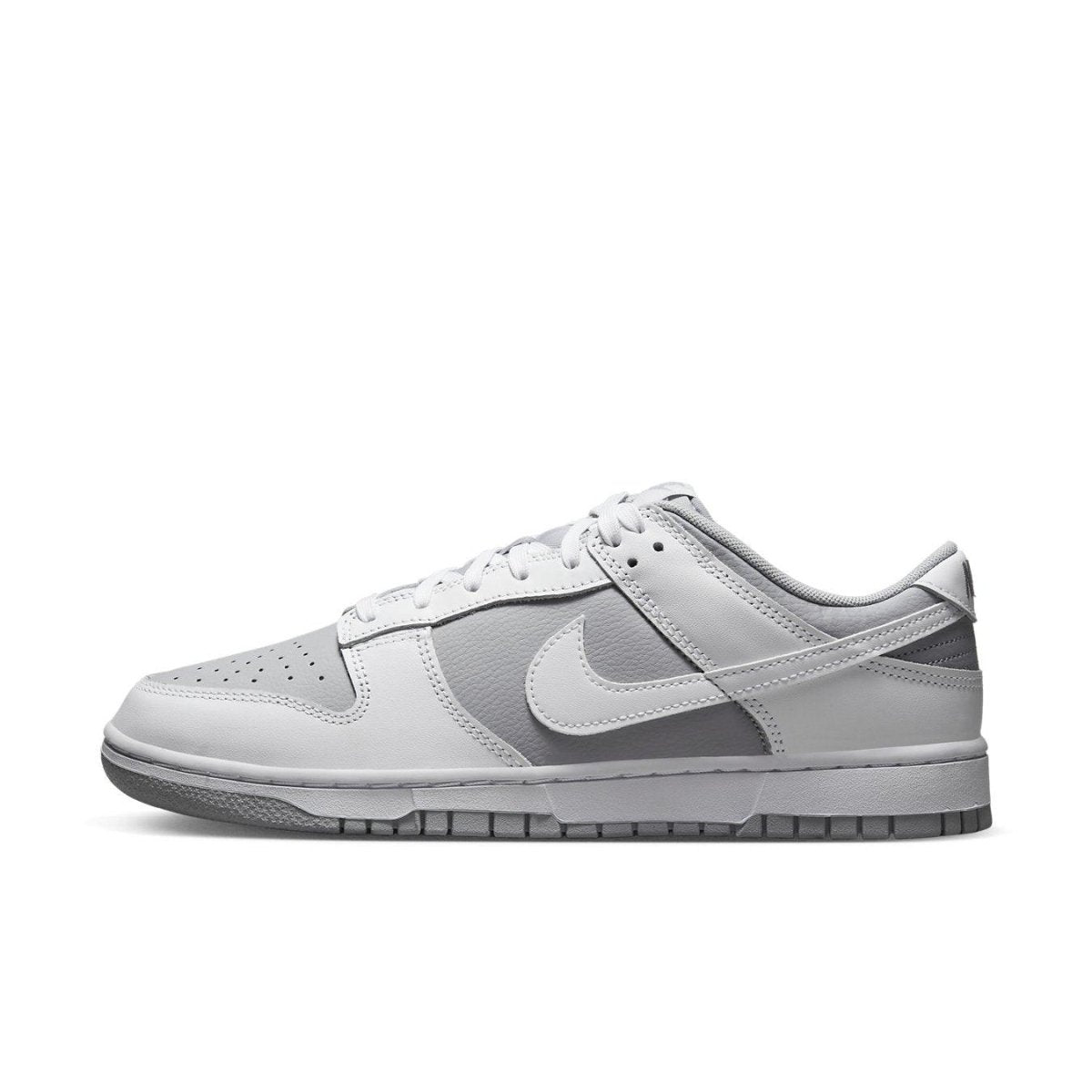 Nike Dunk Low Retro in white and grey showcasing timeless sneaker design.