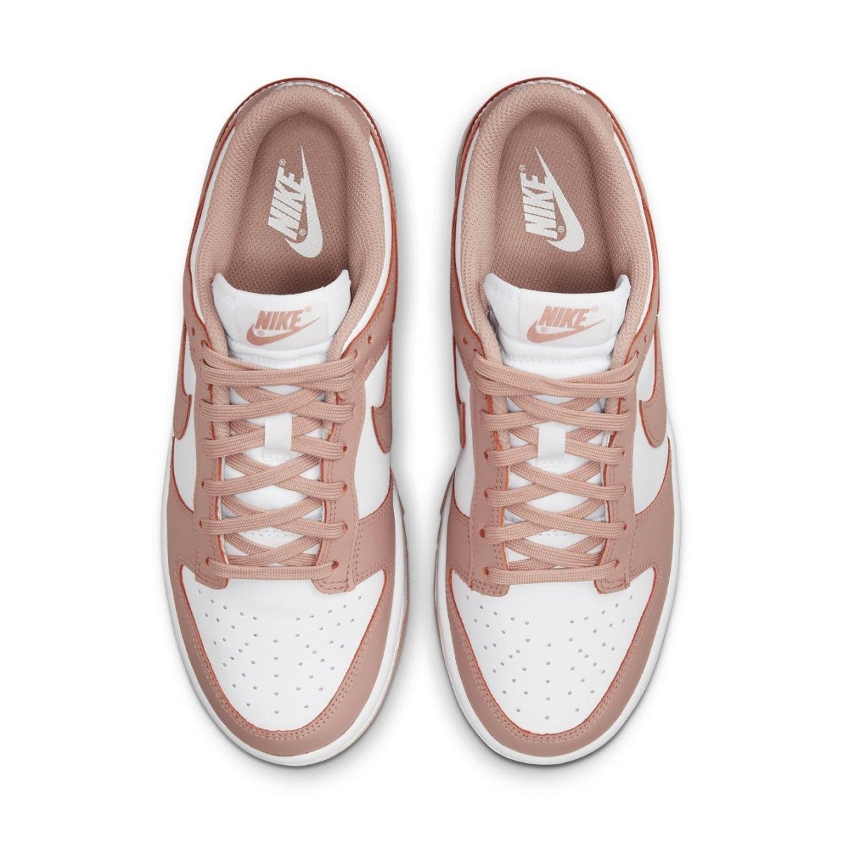 Nike Dunk Low Rose Whisper Women's sneakers with a pink and white color scheme, top view showing the laces and logo.