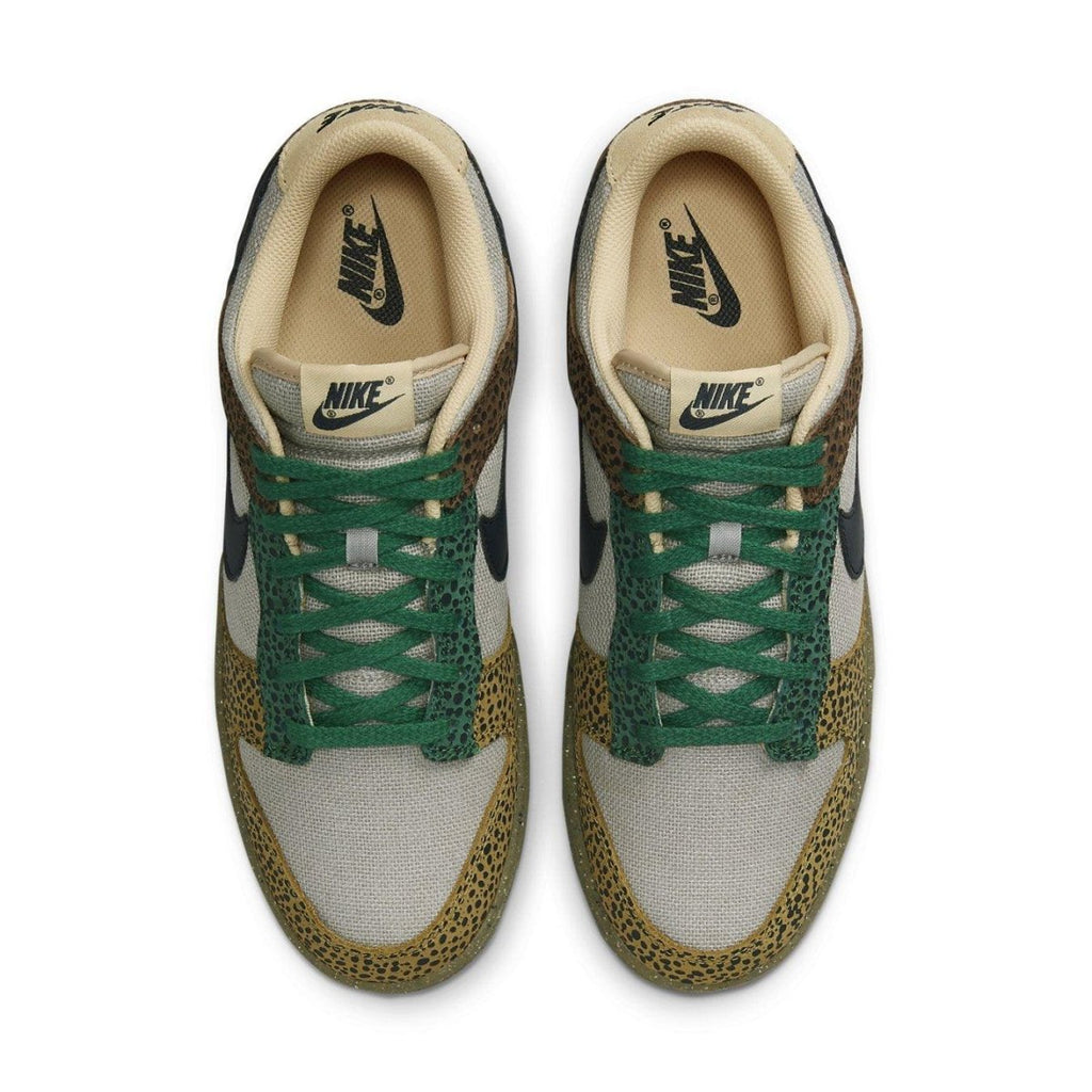 Nike Dunk Low Safari Golden Moss shoes featuring earthy tones, black Swoosh, and emerald green laces.