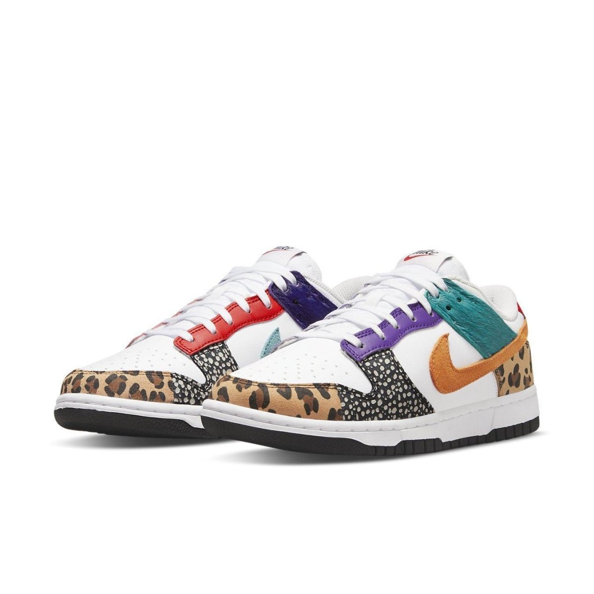 Nike Dunk Low Safari Mix (W) featuring white leather, safari patterns, and leopard Swoosh accents.