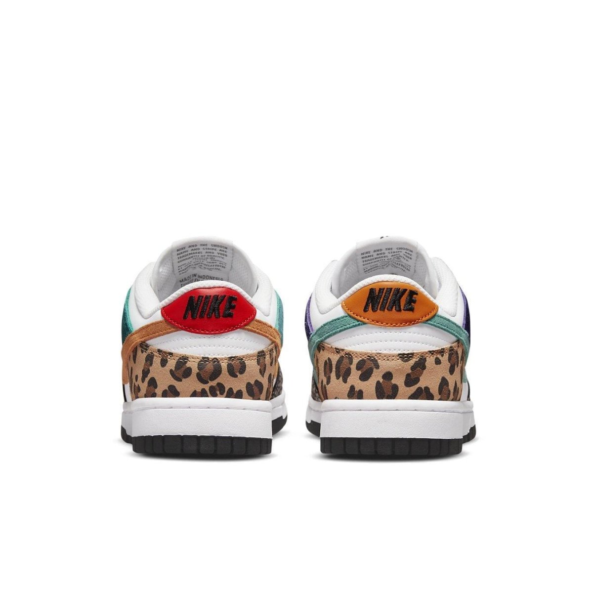 Nike Dunk Low Safari Mix (W) featuring animal print and colorful overlays on a white base.