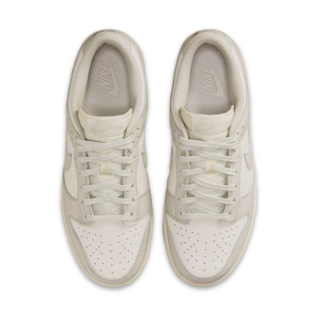 Nike Dunk Low Sail Light Bone women's sneakers, featuring a clean light bone colorway and classic design.
