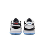 Nike Dunk Low Scrap Black Neutral Gray University Blue White shoes, featuring prominent branding and a stylish blu rubber sole.