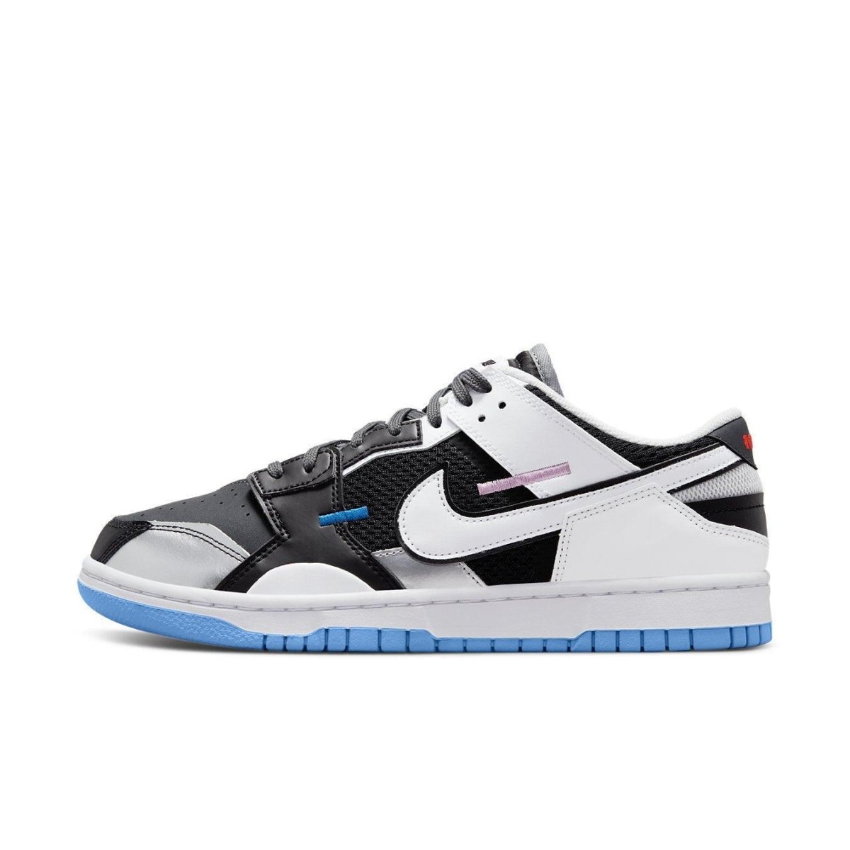 Nike Dunk Low Scrap Black Neutral Grey University Blue White sneaker with patchwork design and rubber sole.