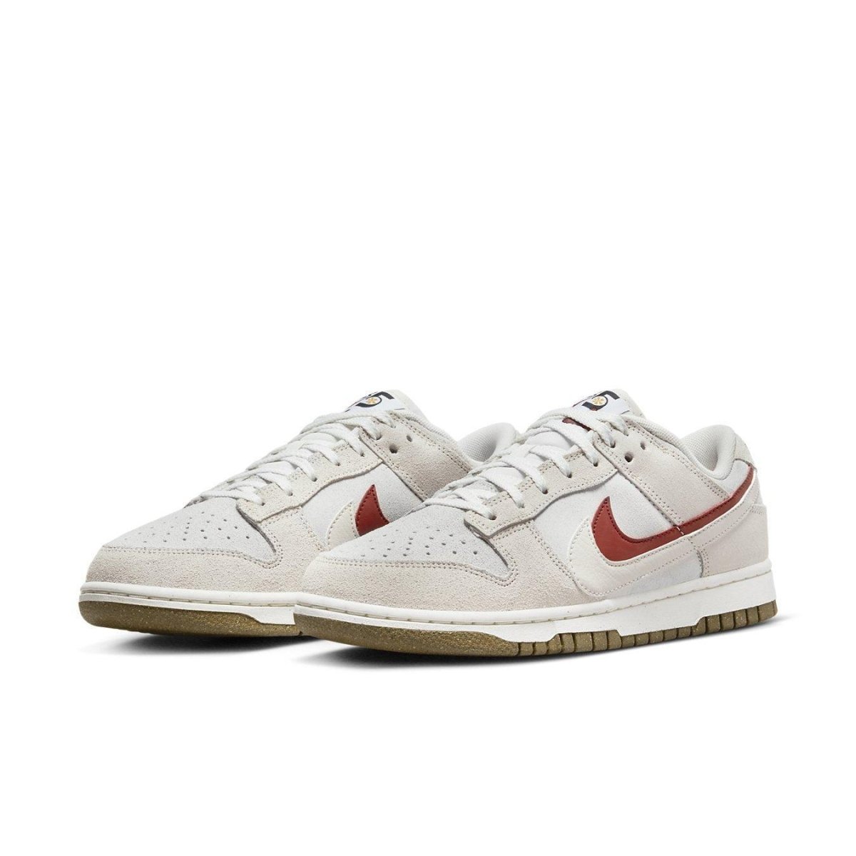 Nike Dunk Low SE 85 Sail Orange sneakers featuring suede upper and Grind sole for eco-friendly style.