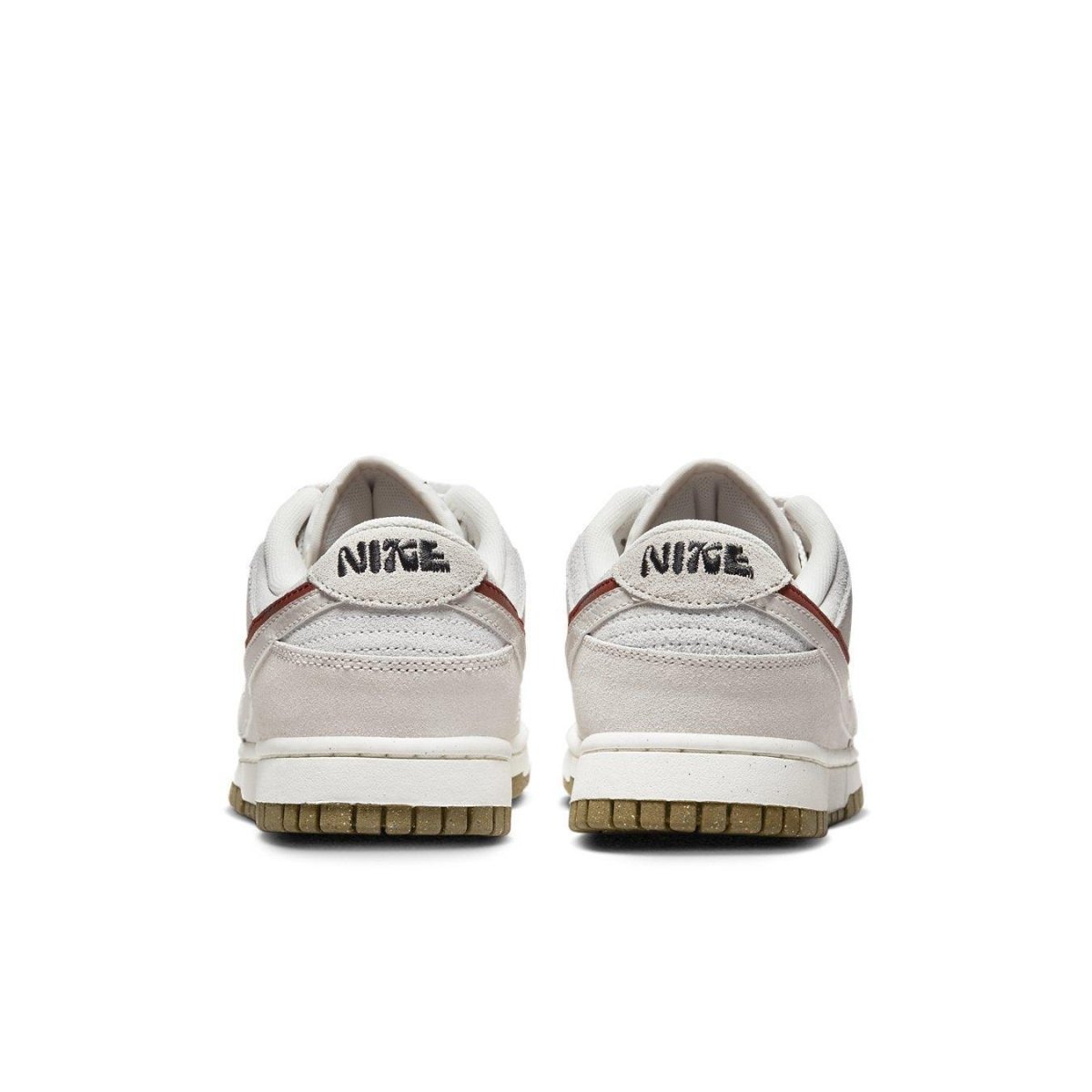 Rear view of the Nike Dunk Low SE 85 Sail Orange sneakers showcasing neutral colors and signature branding.