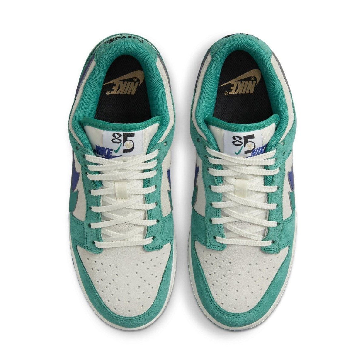 Top view of Nike Dunk Low SE 85 Neptune Green women's sneakers with teal and white design.