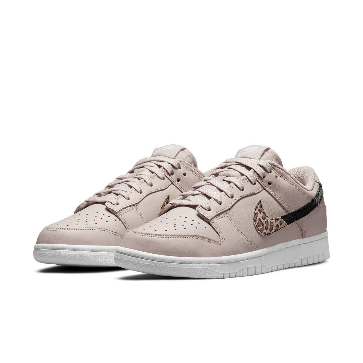 Nike Dunk Low SE Animal Instinct Fossil Stone women’s sneakers with animal print and metallic accents.