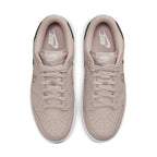Nike Dunk Low SE Animal Instinct in Fossil Stone colorway, featuring animal prints and metallic accents.