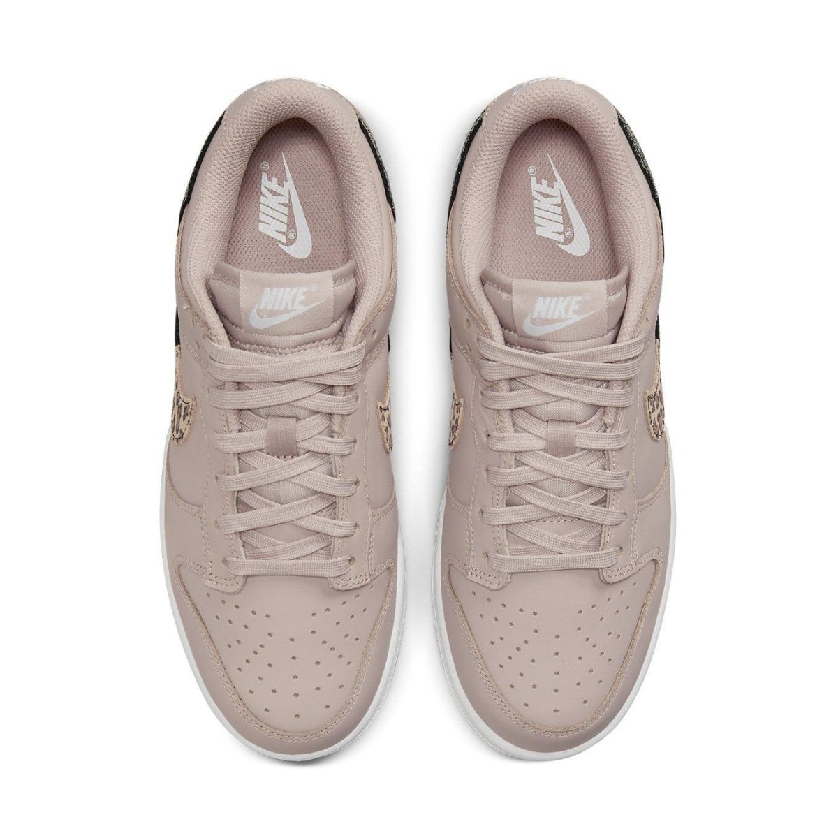 Nike Dunk Low SE Animal Instinct in Fossil Stone colorway, featuring animal prints and metallic accents.