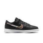 Nike Dunk Low SE Animal Instinct Black with leopard print swoosh on a black leather upper.