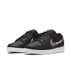 Nike Dunk Low SE Animal Instinct Black for women, featuring black leather upper and animal print swoosh designs.