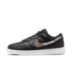 Nike Dunk Low SE Animal Instinct Black (W) with black leather and animal print swoosh.